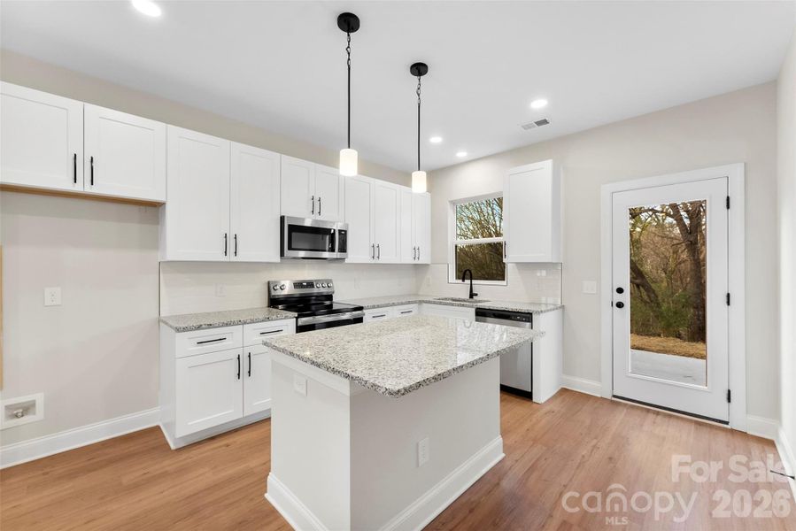 Furnished interior view inside a new home in , Hickory (Image 12).