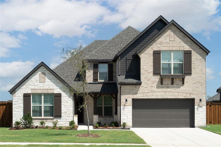 Front exterior of a new home in Lovers Landing, Forney, TX, highlighting curb appeal (Image 1).