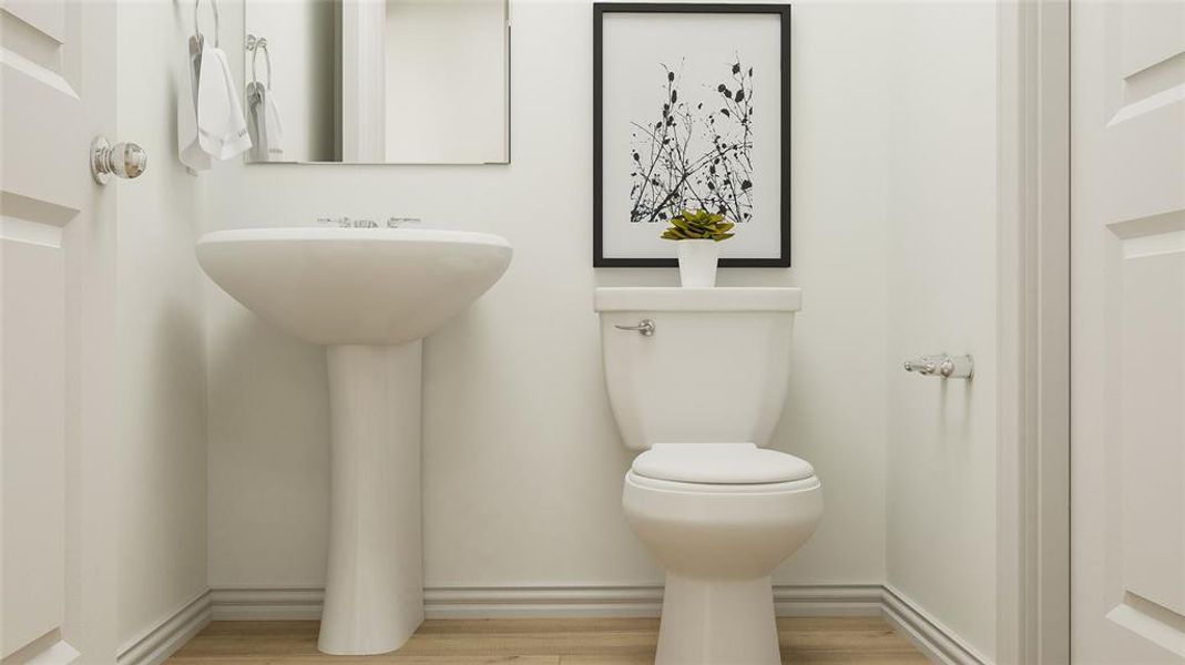 Bathroom with wood-type flooring and toilet