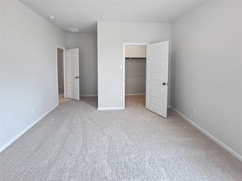The Caldwell- Bedroom 2. Sample image for illustration; upgrades, options, and colors may vary.