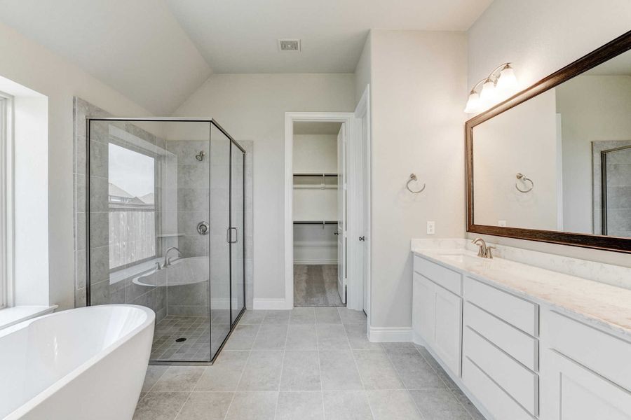 Representative furnished interior of a home built from the 2688 by Ravenna Homes in The Woodlands Hills 65′, Willis (Image 9).
