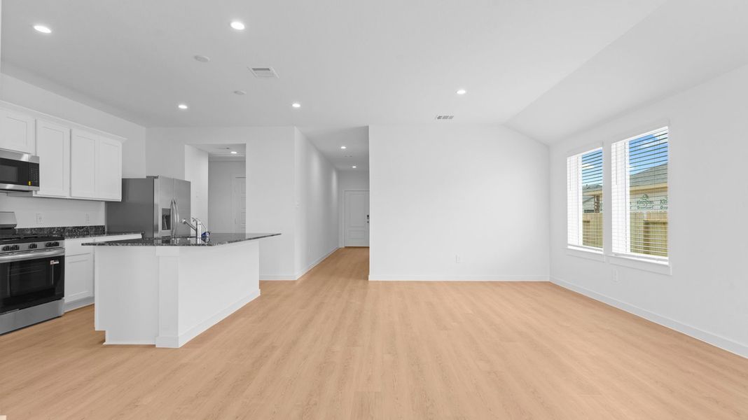 Representative furnished interior of a home built from the Caden by D.R. Horton in Caldwell Crossing, Iowa Colony (Image 9).