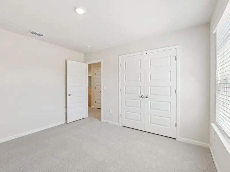 Spacious, unfurnished interior of a new home in Vines at Mill Creek - Estate Series, Braselton (Image 20).