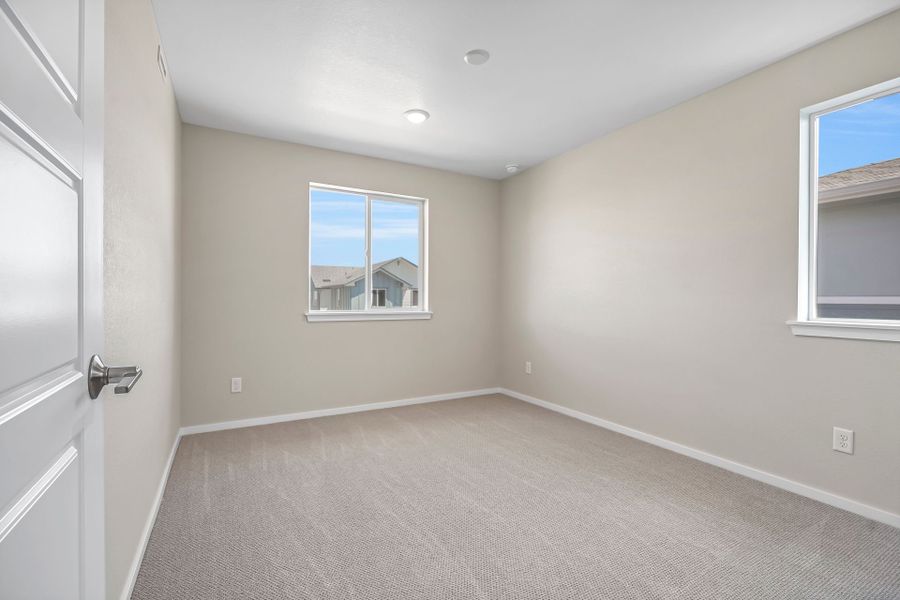 Spacious, unfurnished interior of a new home in Barefoot Village, Firestone (Image 18).