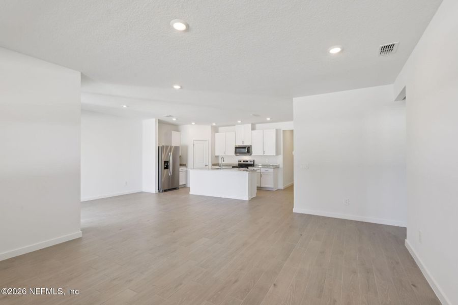 Spacious, unfurnished interior of a new home in Flagler Village - Signature Series, Palm Coast (Image 24).