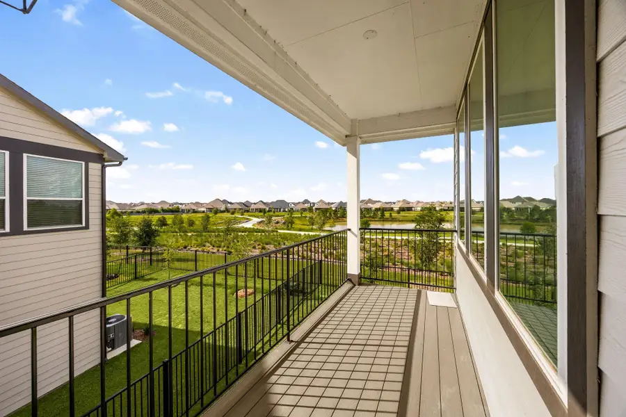 Upstairs covered patio located near the living and dining room
