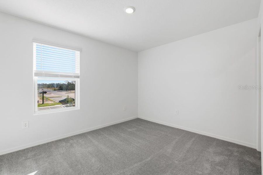 Spacious, unfurnished interior of a new home in The Towns at Firethorn, Parrish (Image 23).