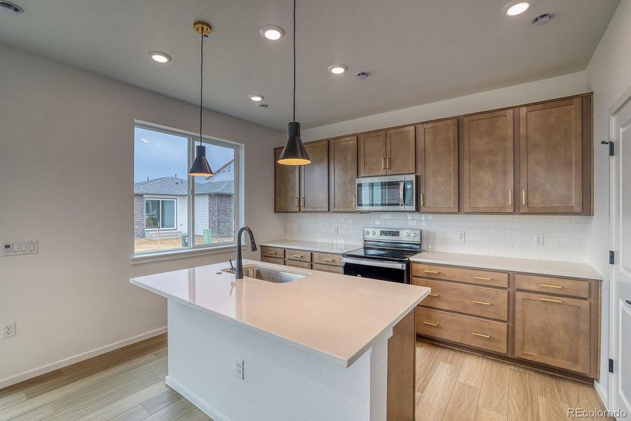 Furnished interior view inside a new home in Harvest Crossing, Aurora (Image 3). Furnished interior view inside a new home in Harvest Crossing, Aurora (Image 3).