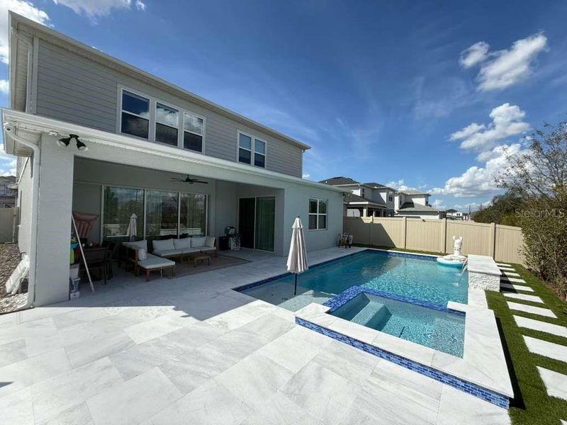 Exterior details and patio area of a home in Parkview Reserve, Orlando (Image 35).
