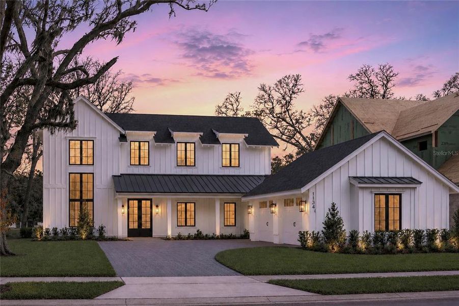 Front exterior of a new home in , Winter Garden, FL, highlighting curb appeal (Image 27). Front exterior of a new home in , Winter Garden, FL, highlighting curb appeal (Image 27).
