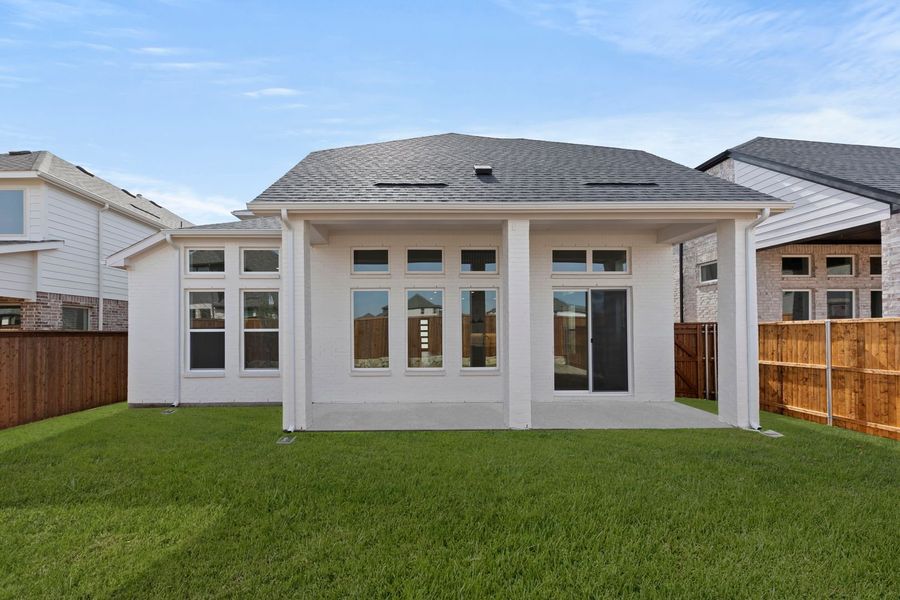 Exterior details and patio area of a home in Lily Creek at Sutton Fields, Aubrey (Image 3). Exterior details and patio area of a home in Lily Creek at Sutton Fields, Aubrey (Image 3).