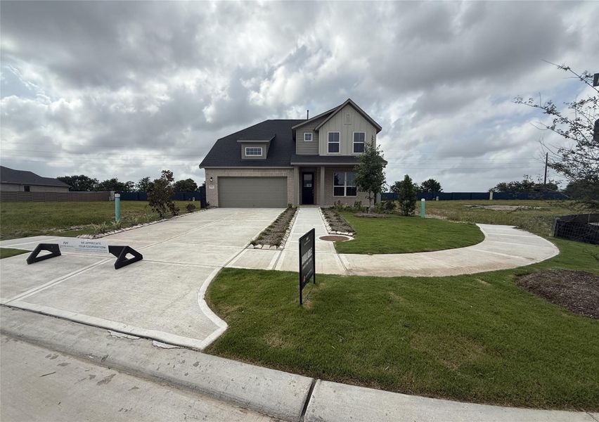 Front exterior of a new home in Austin Point, Richmond, TX, highlighting curb appeal (Image 5).