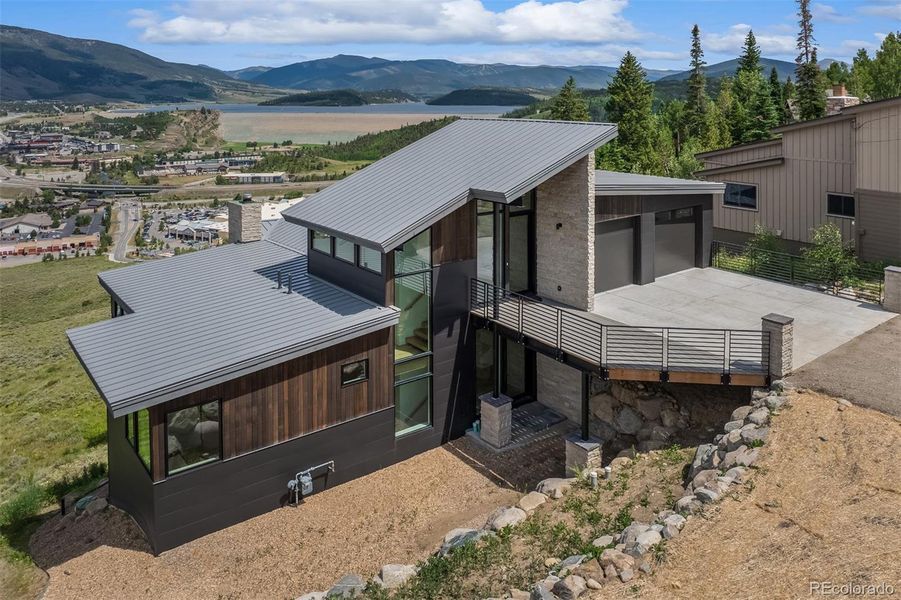 Front exterior of a new home in , Silverthorne, CO, highlighting curb appeal (Image 24).