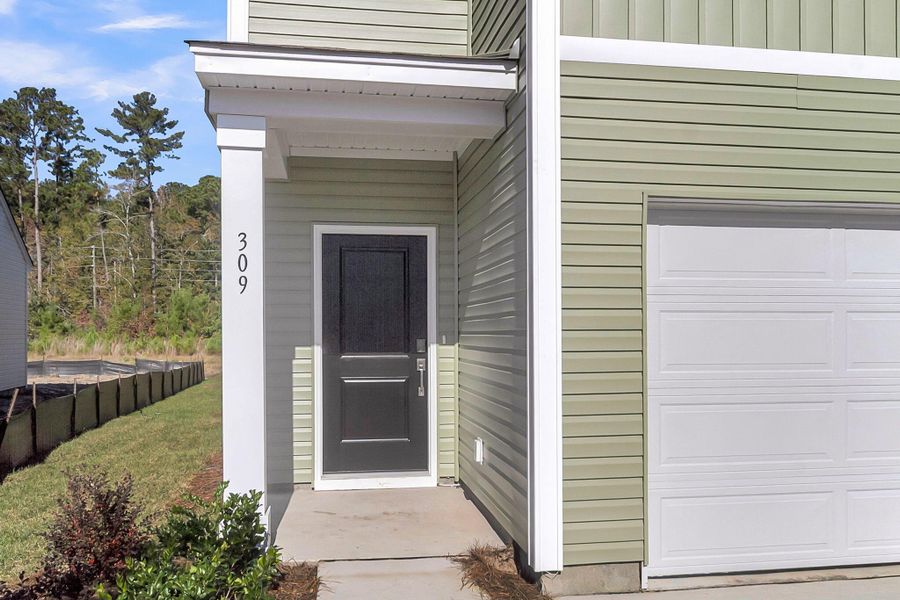 Exterior details and patio area of a home in Wildcat Chase, Summerville (Image 15).