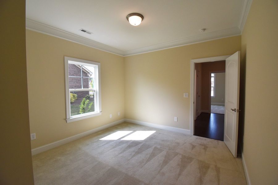 Representative unfurnished interior of a home built from the Cosmopolitan by Keystone Homes NC in Weybridge, Burlington (Image 20).