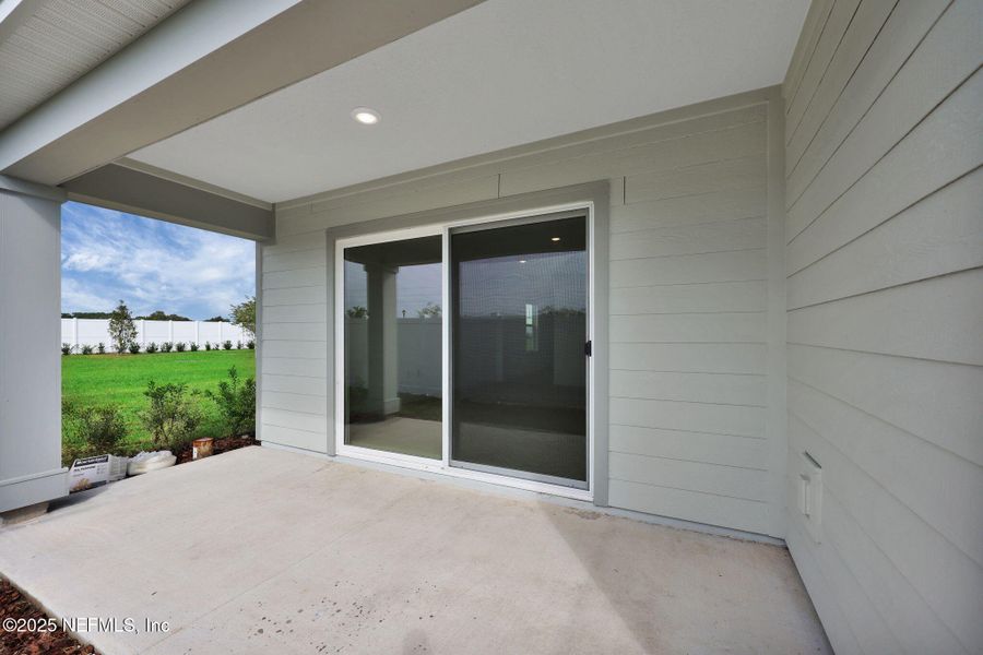 Exterior details and patio area of a home in Wells Landing, Jacksonville (Image 2). Exterior details and patio area of a home in Wells Landing, Jacksonville (Image 2).