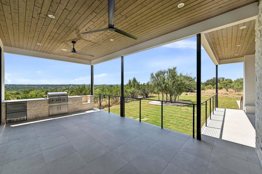 Outdoor kitchen with built-in grill, beverage drawers and space for smoker. Outdoor kitchen with built-in grill, beverage drawers and space for smoker.