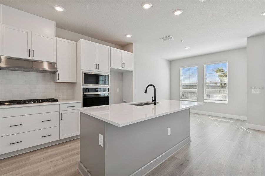 Furnished interior view inside a new home in Emerald Landing at Waterside at Lakewood Ranch – Towns, Sarasota (Image 9).