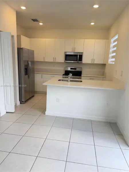 Furnished interior view inside a new home in , Homestead (Image 5).