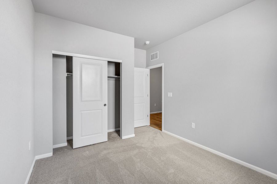 Spacious, unfurnished interior of a new home in Talon Pointe, Thornton (Image 15).