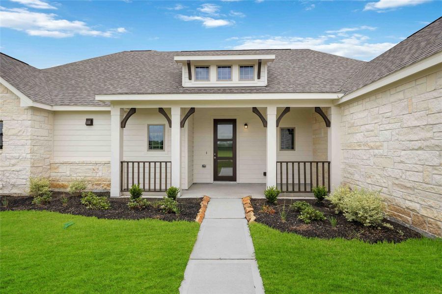 Welcoming front elevation with charming architectural lines and warm curb appeal. Welcoming front elevation with charming architectural lines and warm curb appeal.
