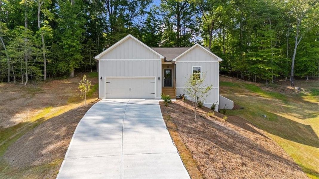 Front exterior of a new home in , Gainesville, GA, highlighting curb appeal (Image 23).