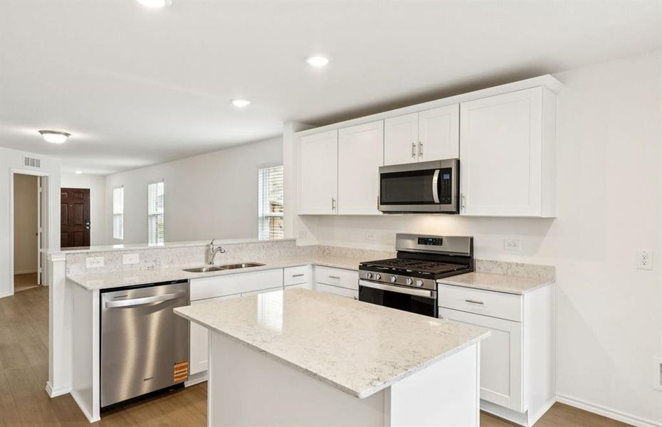 Airy kitchen with ample cabinet space