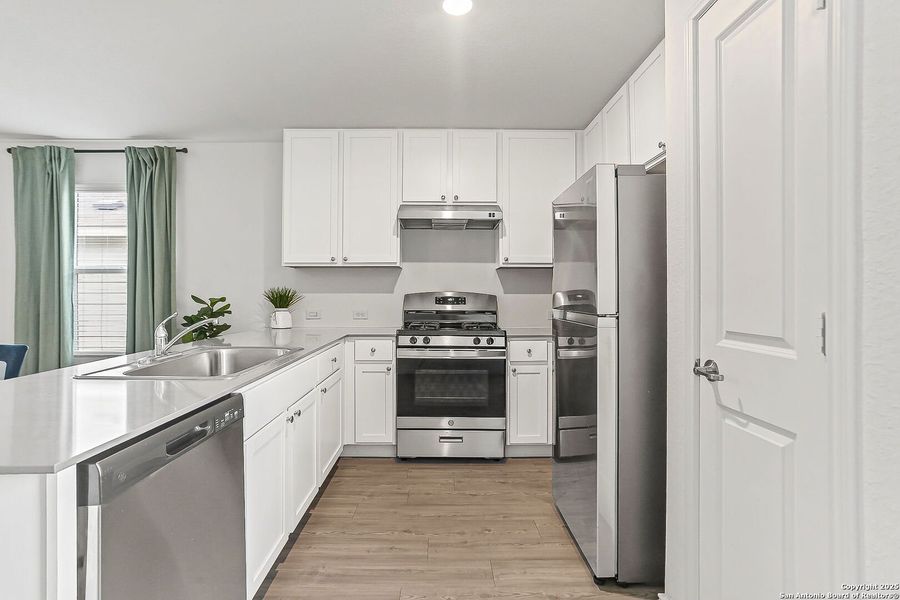 Furnished interior view inside a new home in , San Antonio (Image 12).