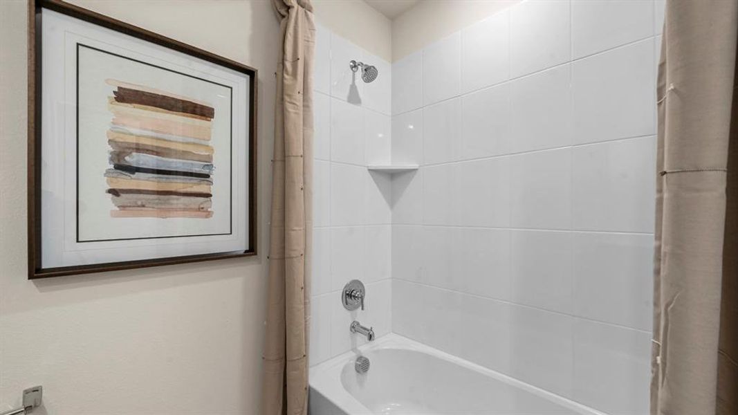 Full bath with shower / tub combo with curtain Full bath with shower / tub combo with curtain