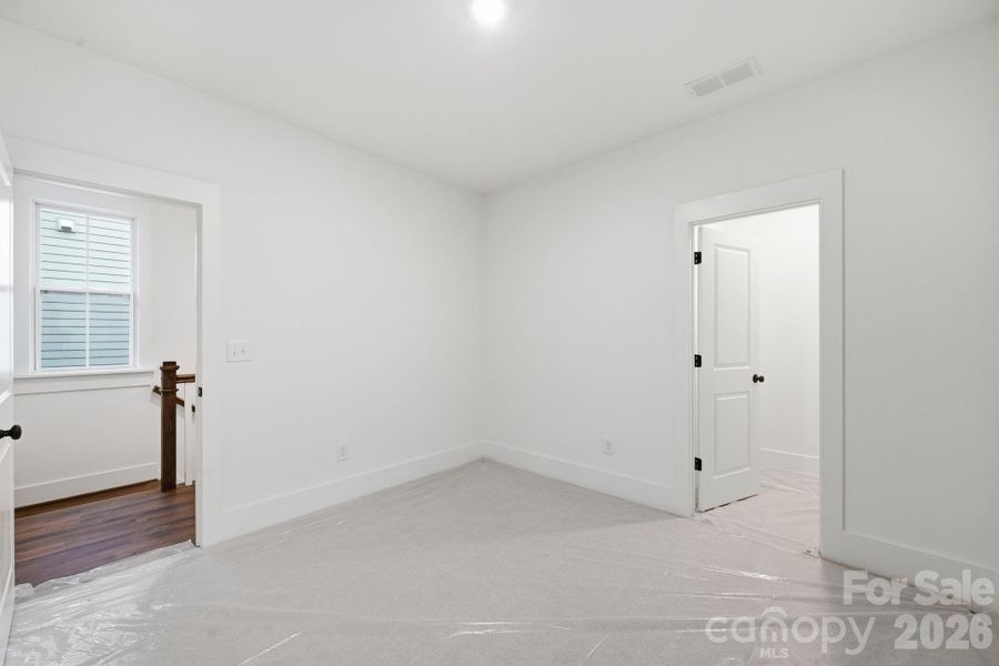 Bedroom #2 features a walk-in closet