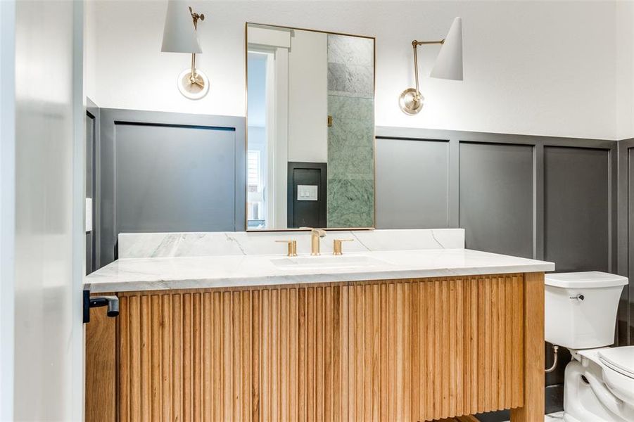 Bathroom with vanity and toilet