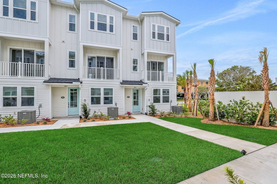 Exterior details and patio area of a home in North Beach Townhomes, Jacksonville Beach (Image 25).