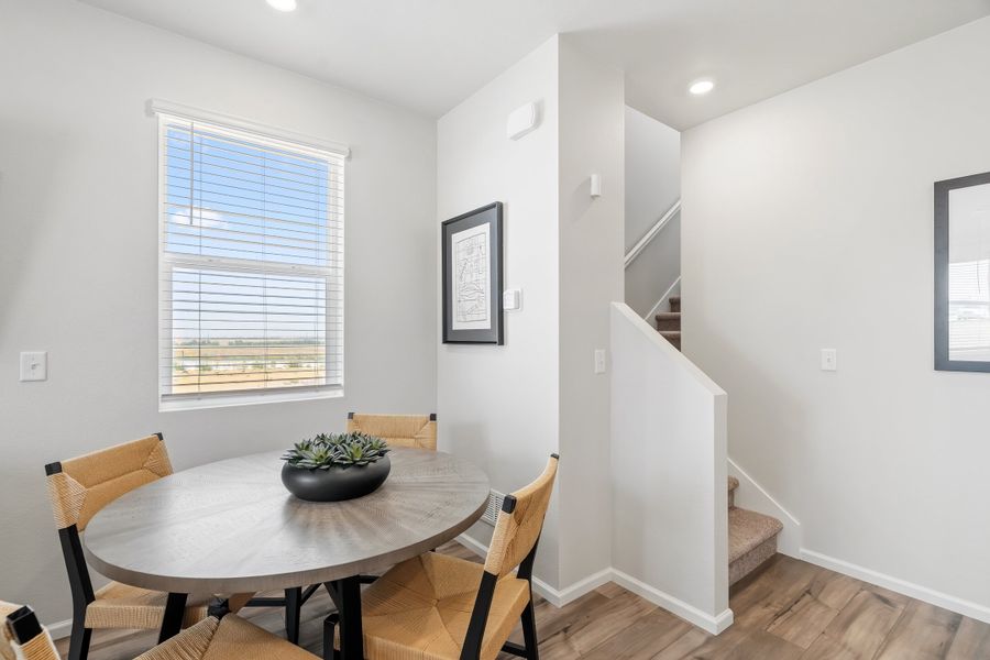 Representative furnished interior of a home built from the 2003 by Risewell Homes in Harvest Crossing, Aurora (Image 9).