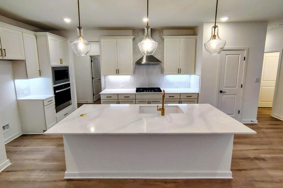 Furnished interior view inside a new home in Wolf Ranch, Georgetown (Image 11).