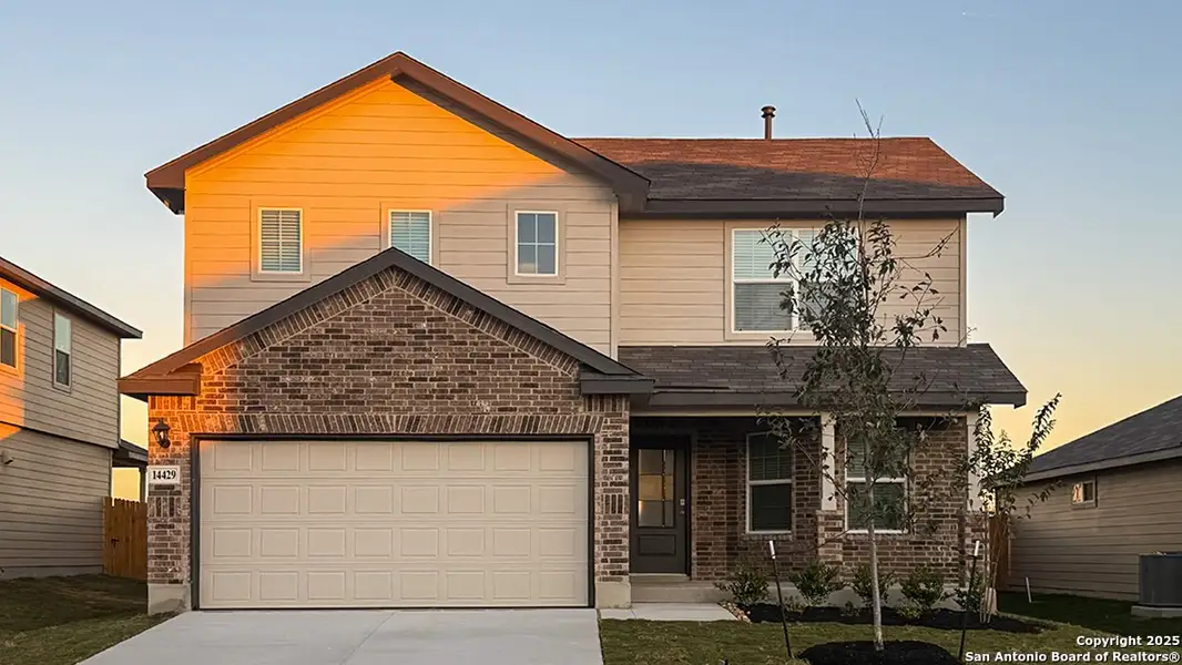 Front exterior of a new home in Riverstone at Westpointe, San Antonio, TX, highlighting curb appeal (Image 2).