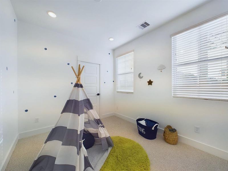 Secondary bedroom on the second floor.