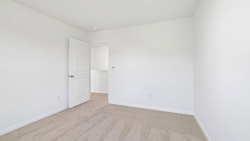 Spacious, unfurnished interior of a new home in Shahbain Reserve, Raeford (Image 32). Spacious, unfurnished interior of a new home in Shahbain Reserve, Raeford (Image 32).