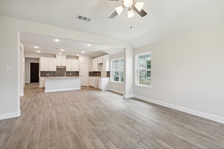 Representative unfurnished interior of a home built from the Blackberry III by Megatel Homes in Santorini, Seagoville (Image 8). Representative unfurnished interior of a home built from the Blackberry III by Megatel Homes in Santorini, Seagoville (Image 8).