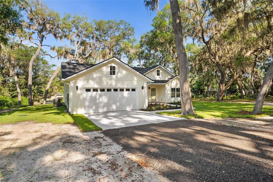 Front exterior of a new home in , Melrose, FL, highlighting curb appeal (Image 2). Front exterior of a new home in , Melrose, FL, highlighting curb appeal (Image 2).