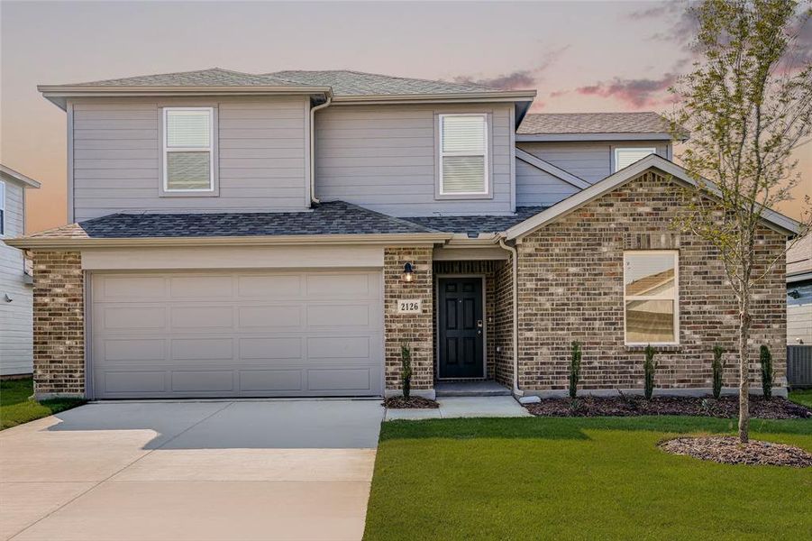 Front exterior of a new home in River Ridge, Crandall, TX, highlighting curb appeal (Image 19).