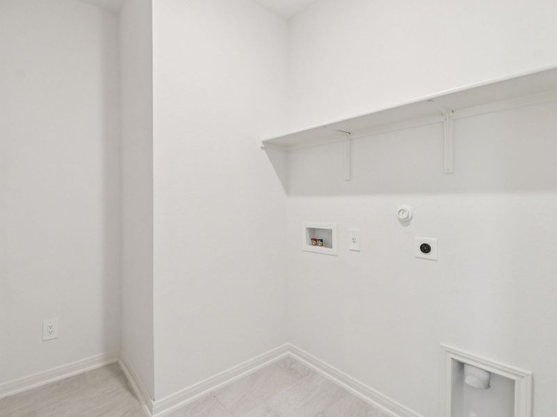 Laundry room in the Callaghan floorplan at a Meritage Homes community. Laundry room in the Callaghan floorplan at a Meritage Homes community.