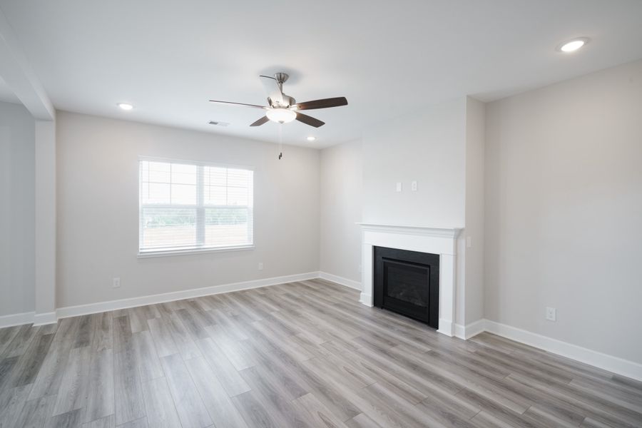 Representative unfurnished interior of a home built from the The Holland by Cothran Homes in Holly Ridge, Greenville (Image 16).