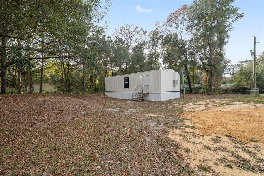 Exterior details and patio area of a home in , Summerfield (Image 22).