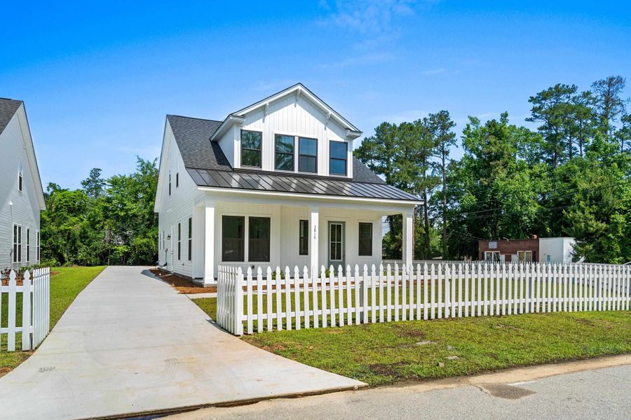 Front exterior of a new home in Downtown Loris Homes, Loris, SC, highlighting curb appeal (Image 25).
