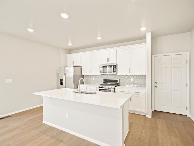 The Breckenridge floorplan interior image taken at a Meritage Homes community in Berthoud, CO.