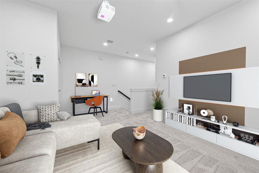 This modern living space features a cozy seating area. Neutral tones and recessed lighting create a bright, inviting atmosphere.