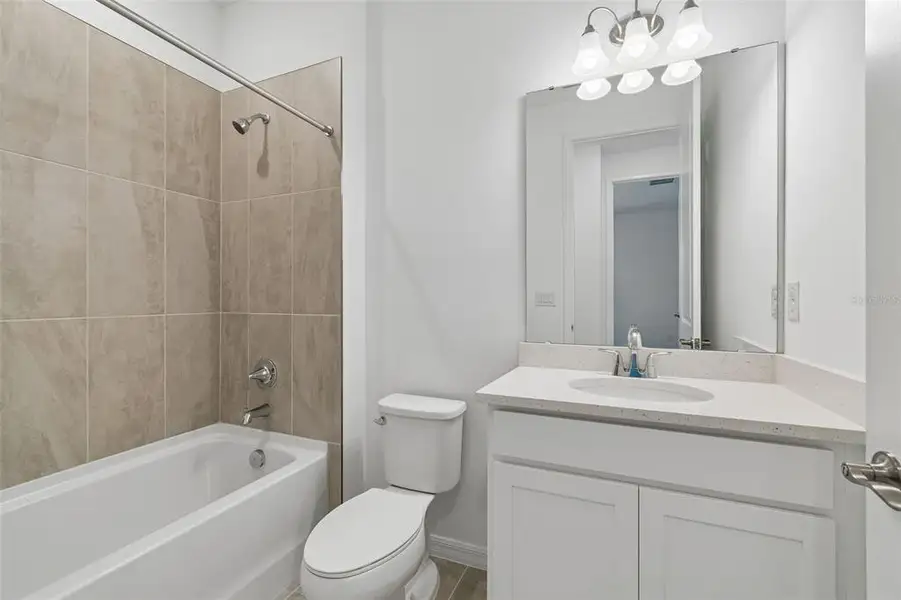 Furnished interior view inside a new home in Fairway Pointe - 55+ Villa Community, Sun City Center (Image 4).