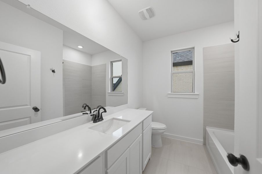 Furnished interior view inside a new home in Cottages of Celina, Celina (Image 12).