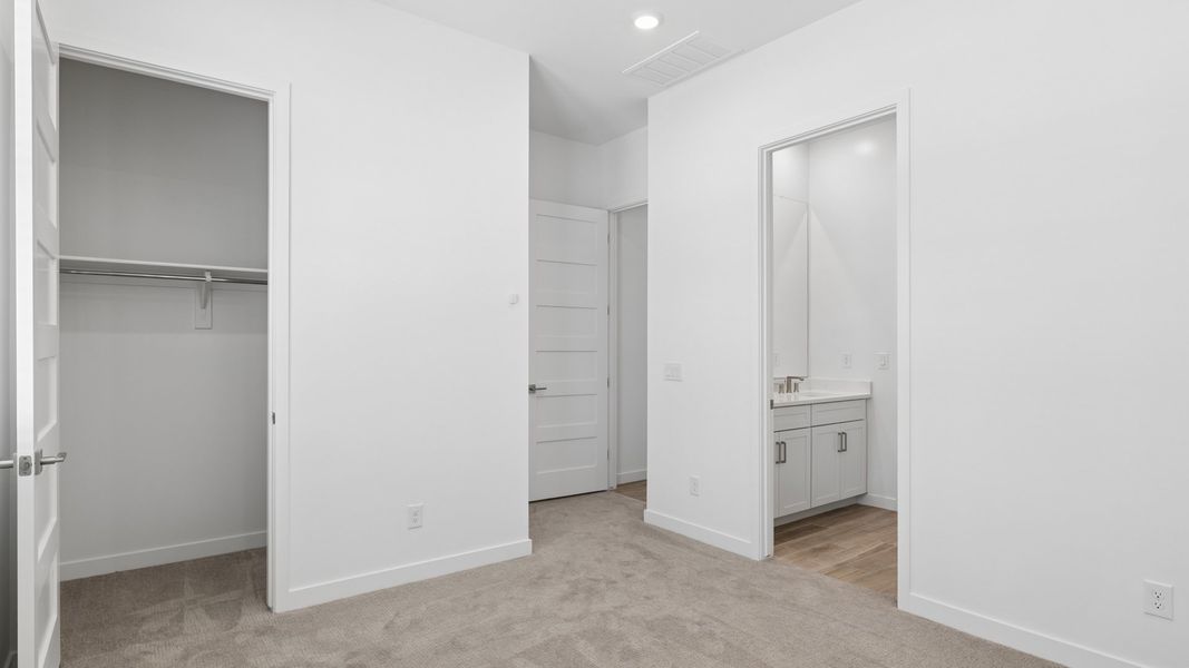 Spacious, unfurnished interior of a new home in The Ridge at Stone Butte, Phoenix (Image 36).