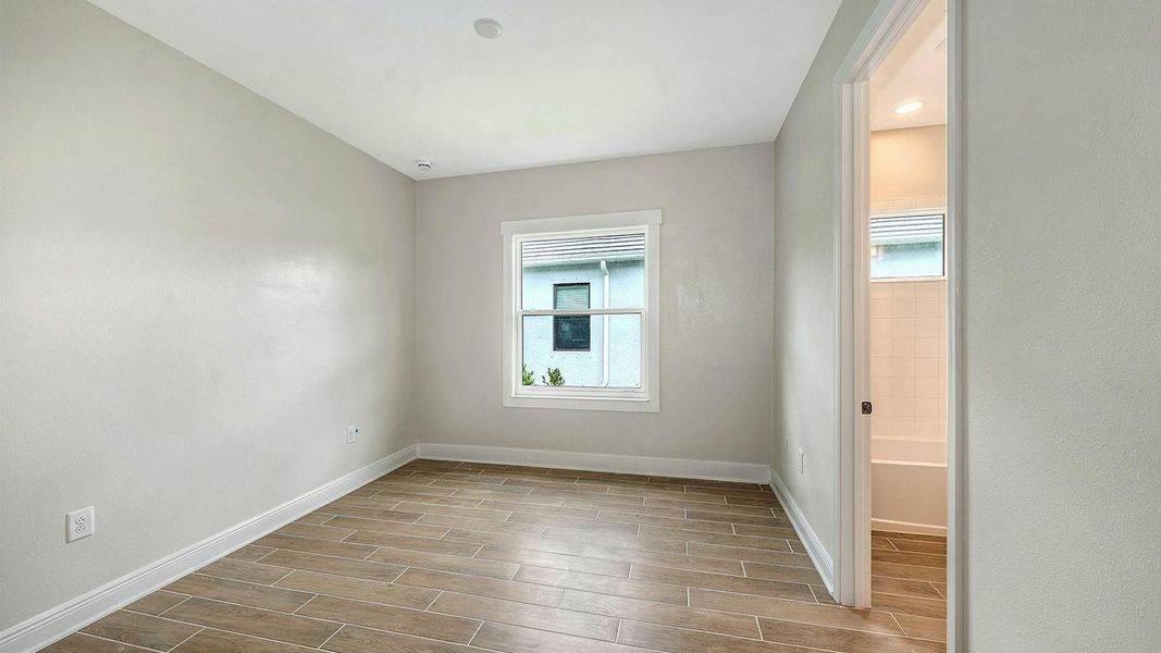 Spacious, unfurnished interior of a new home in Grand Park Real Estate and Homes for Sale in Sarasota, FL - Neal Communities, Sarasota (Image 37).